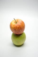 two apples stacked on each other