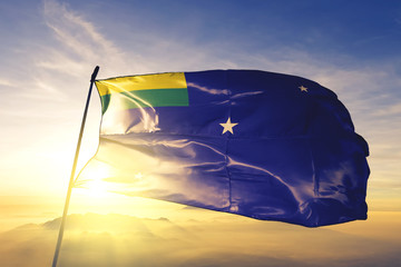 Lages of Brazil flag waving on the top sunrise mist fog