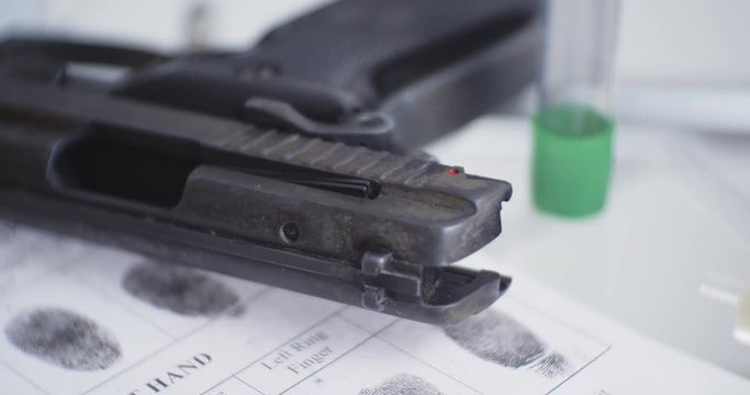 CSI balistic expertise gun close up