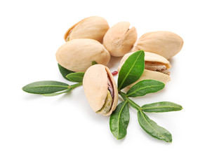 Tasty pistachio nuts on white background