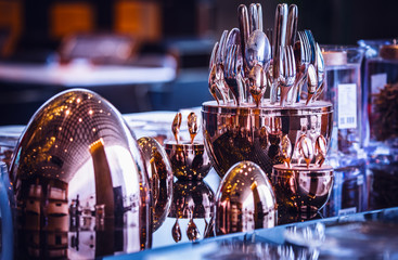 Sets of modern stylish kitchen utensils.