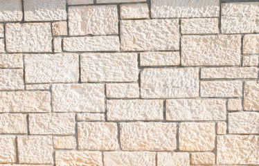 Texture of a stone wall. Old stone wall texture background. Stone wall as a background or texture. Greek stone wall.