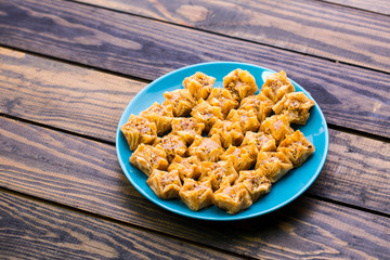 turkish baklava on a vintage wooden table