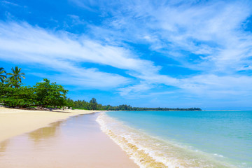 Pristine white sandy beach with aqua blue sea in Khao Lak close to Phuket Island on the Andaman Coast, Phang Nga Province, Thailand.