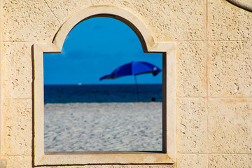 Stone Wall at the Beach in Fort Lauderdale in Florida where you look through to the Beach