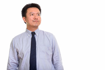 Studio shot of Japanese man isolated against white background