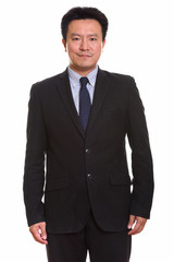Studio shot of Japanese man isolated against white background