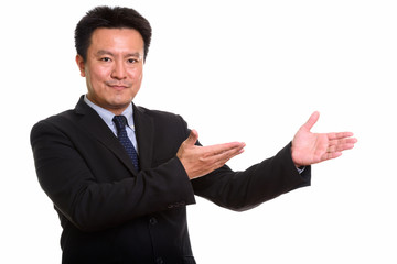 Studio shot of Japanese man isolated against white background