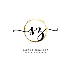 Fototapeta premium Initials letter SZ vector handwriting logo template. with a circle brush and splash of gold paint