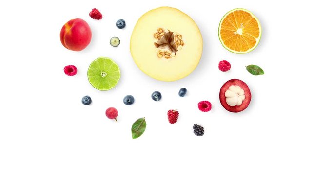 Motion animation with fruits on a white background. Top view. Melon, orange, lime, apricot, raspberry, blueberry and mangosteen on white background 4K.
