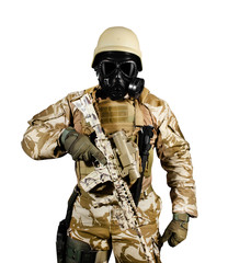 Soldier with gas mask in uniform, armor and rifle standing isolated on white background.