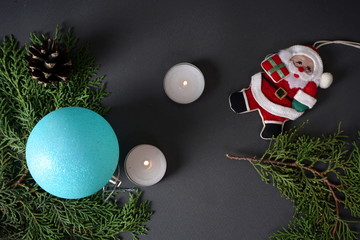 Christmas decorations, candles on a gray background