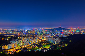 Twilight of Seoul Downtown cityscape . Aerial view of Nansan Seoul Tower and lotte tower. Viewpoint from Ansan mountain best landmark of Seoul , South Korea