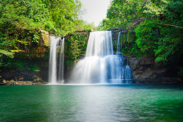Fototapeta na wymiar Waterfall flowing through rocks in rainy season.