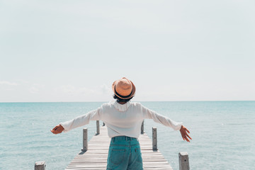 A girl resting on the sea and holiday to travel concept.