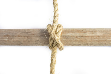 Clove Hitch around a wooden Spar in natural Sisal Rope.