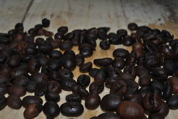 coffee beans with a wooden background