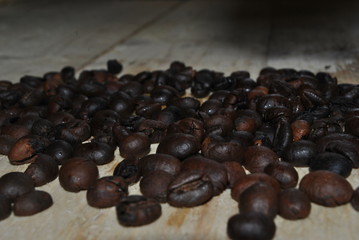 coffee beans with a wooden background