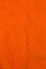 This is a photograph of Orange neon fabric