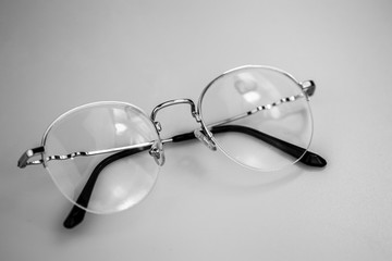 Fototapeta na wymiar Close up eye glasses on white background.