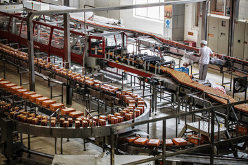 Carbonated drinks factory with view of production and bottles.