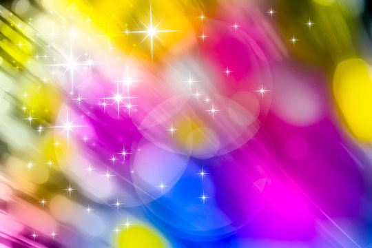 Stars and stardust on colorful rainblow bokae blurred background, Christmas holidays background concept and space for copy space