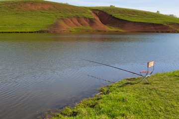 Fototapeta na wymiar Beautiful view of river, fishing rod