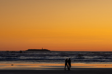 Sunset Walk On The Beach