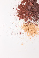 This is a photograph of Light Mahogany,Bisque and Red Brown Matte Powder Eyeshadow isolated on a White Background