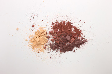 This is a photograph of Light Mahogany,Bisque and Red Brown Matte Powder Eyeshadow isolated on a White Background