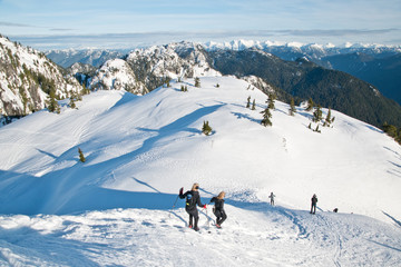Fototapeta na wymiar Snowshoeing in Mt. Seymour in Vancouver, BC