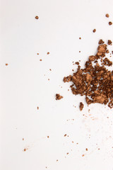 This is a photograph of a Metallic Bronze Powder Eyeshadow isolated on a White Background