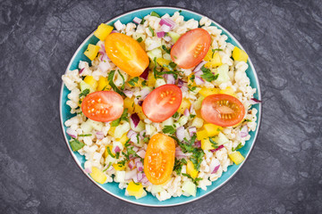 Salad with vegetables and bulgur groats. Healthy meal containing vitamins and minerals