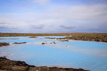 Blue lagoon - Volcanic formations filled with white-blue warm water.