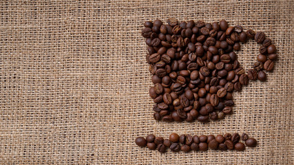 coffee beans on jute that forms a cup