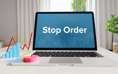 Stop Order – Statistics/Business. Laptop in the office with term on the display. Finance/Economics.