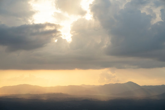 Beautiful Strom Rain Clouds With Sunrays At Sunset