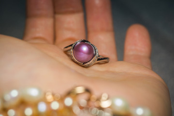 Silver ring with purple pearl