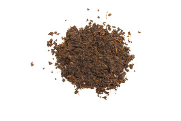 Top view of Pile heap brown soil or fertile soil for planting isolated on white background.