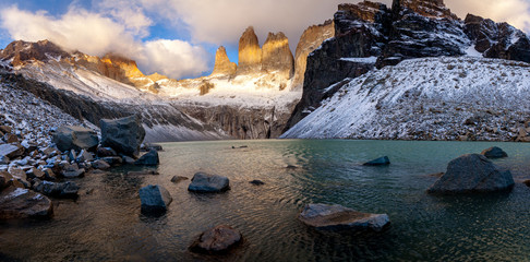 Sunrise over the three Peaks forming the Torres del paine, Patagonia, Chile