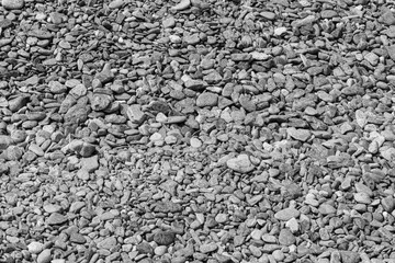 Black small road stone background, dark gravel pebbles stone texture, granite,marble