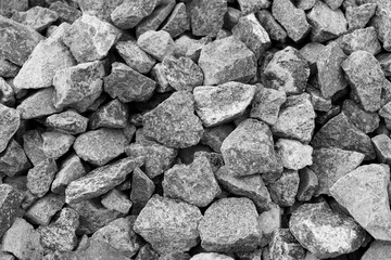 Black small road stone background, dark gravel pebbles stone texture, granite,marble