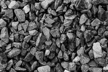 Black small road stone background, dark gravel pebbles stone texture, granite,marble