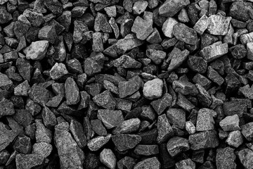 Black small road stone background, dark gravel pebbles stone texture, granite,marble