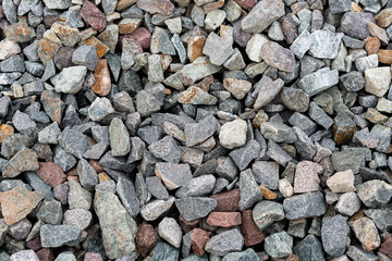 Black small road stone background, dark gravel pebbles stone texture, granite,marble
