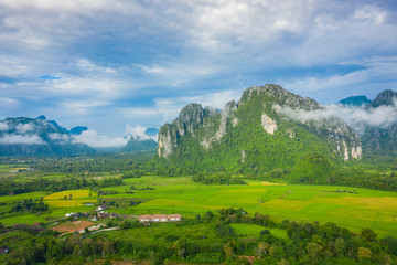 Fototapeta na wymiar Aerial view of beautiful landscapes at Vang Vieng , Laos. Southeast Asia. Photo made by drone from above. Bird eye view.