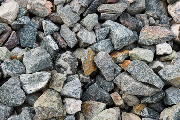 Black small road stone background, dark gravel pebbles stone texture, granite,marble