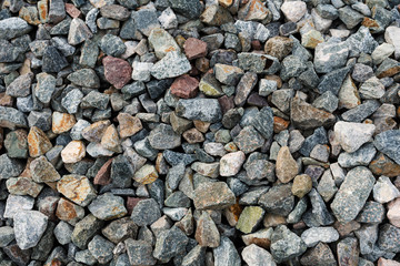 Black small road stone background, dark gravel pebbles stone texture, granite,marble