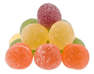 Pile of pyramid from balls of marmalade, Fruit jellies Isolated on a white background.