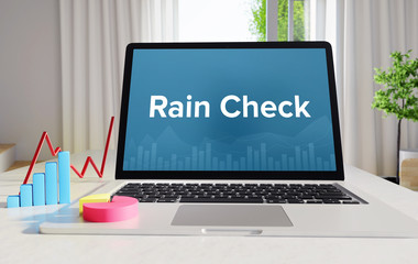 Rain Check – Statistics/Business. Laptop in the office with term on the display. Finance/Economics.